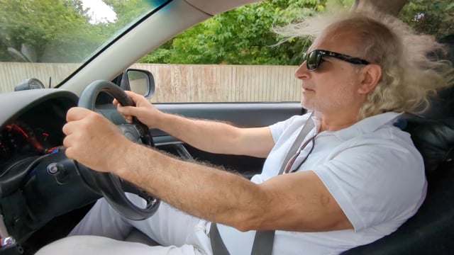 Man driving a car