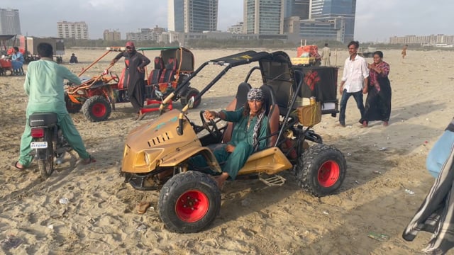 Man in dune buggy