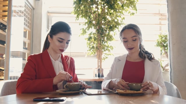 Two women having coffee