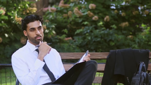 Writing notes in the park