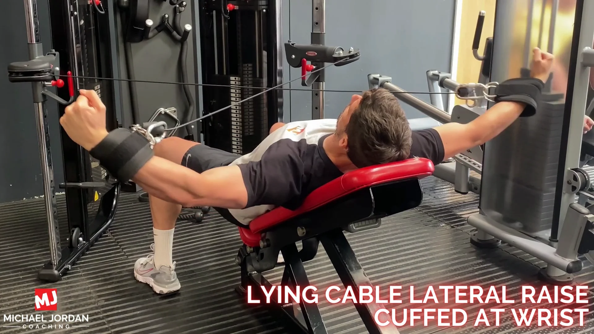 lying cable lateral raise cuffed at wrist