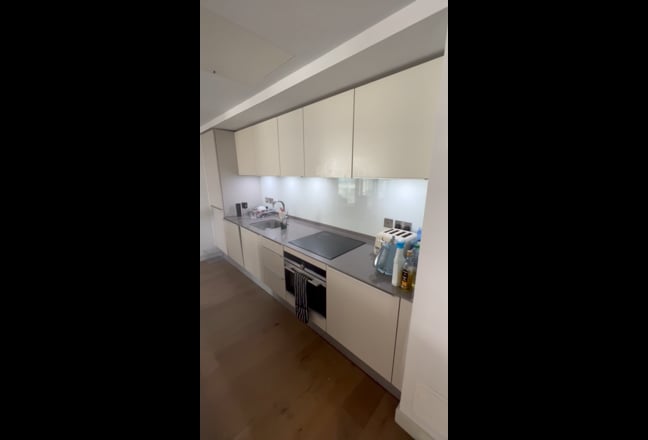 Video 1: Open plan living room, dining room and kitchen with balcony