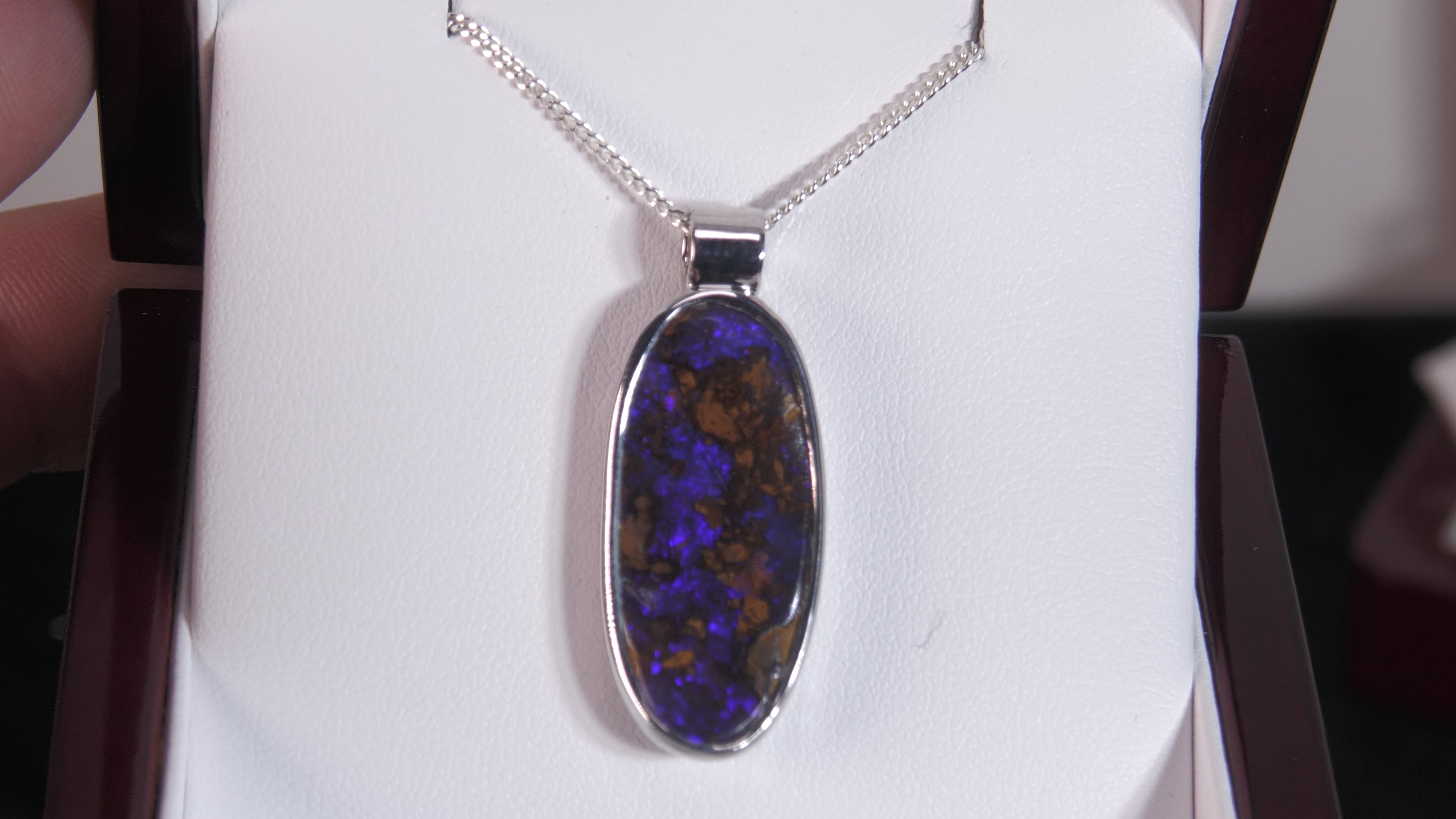 silver pendant on Vimeo