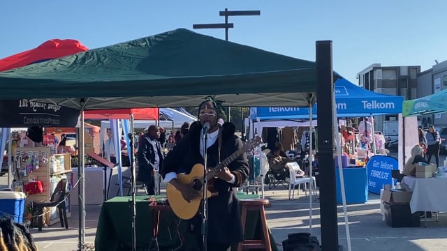 Guy playing guitar