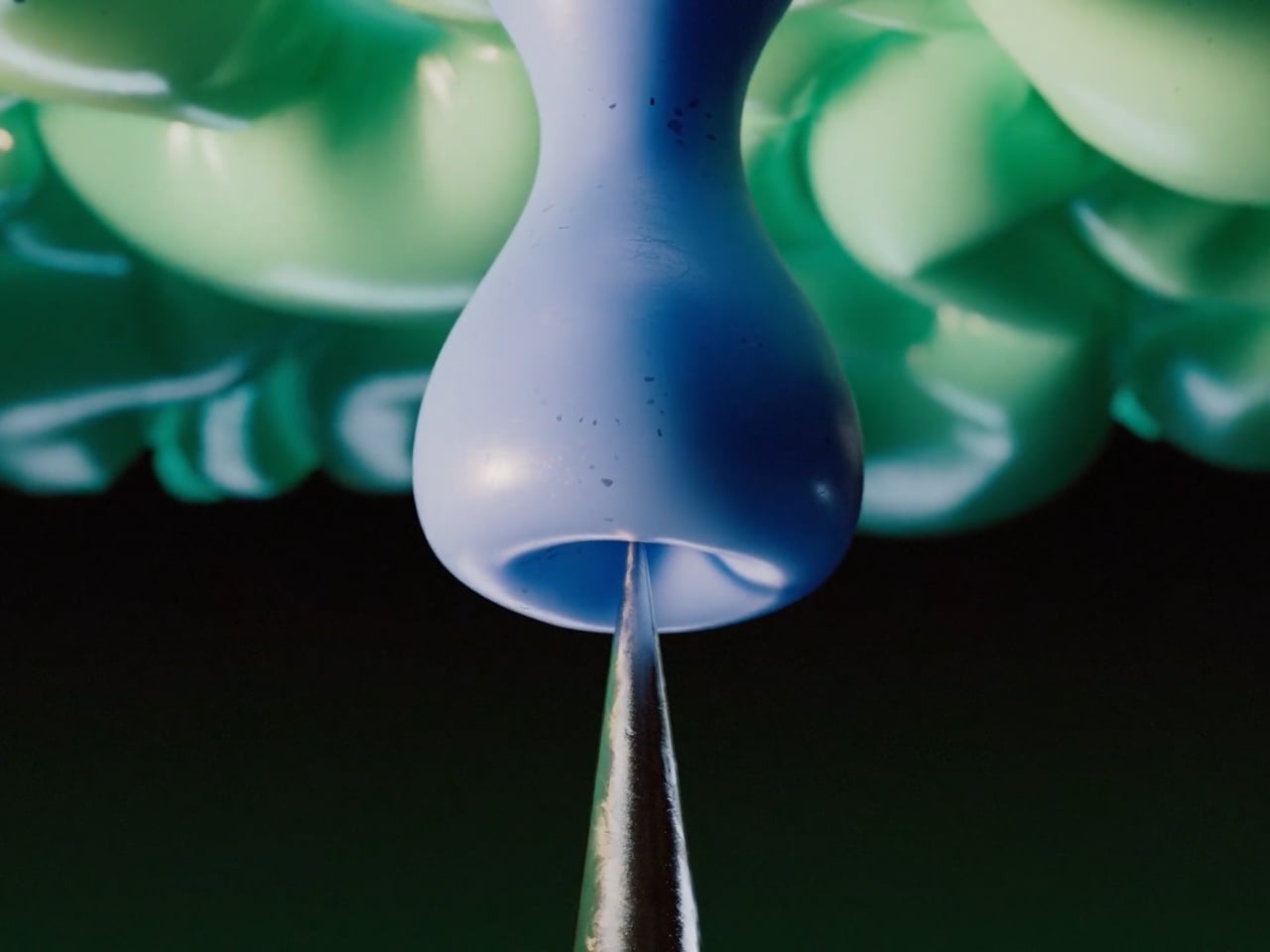 A frame from Bobbling balloons, a 3D and motion experiment.
