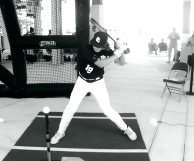 Unidentified baseball player in dark uniform - pitching f…