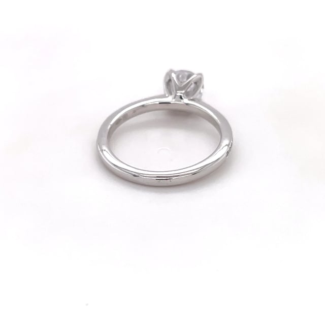 0.90 carat solitaire ring in white gold with side diamonds
