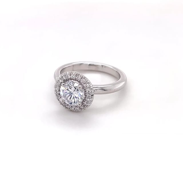 1.50 carat solitaire halo ring in yellow gold with round diamonds