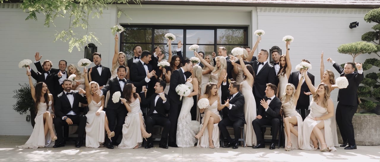 Hailey and Ian with their wedding party in the poster for their Los Angeles wedding film