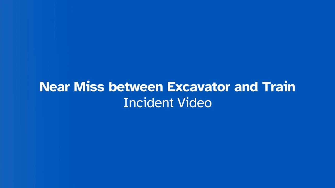 Trackside near miss between an excavator and a train