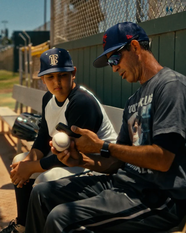 A baseball player resting on the bench., Stock Video - Envato Elements