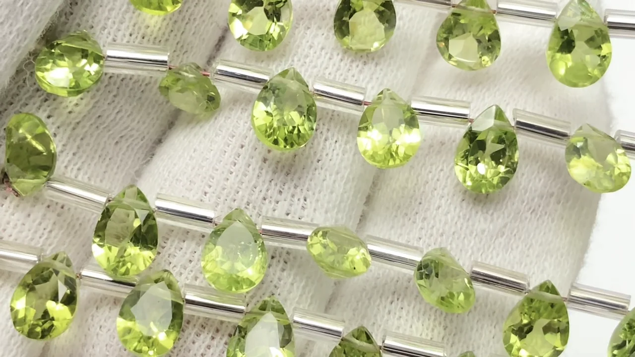 ペリドット ペアシェイプファセットカット7×5mm 1連（18粒）｜天然石