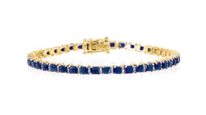 10.00 ct. t.w. Sapphire and .50 ct. t.w. Diamond Tennis Bracelet in 18kt Gold Over Sterling