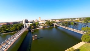 Images of Waco: Aerial of Suspension Bridge and Doris Miller Memorial