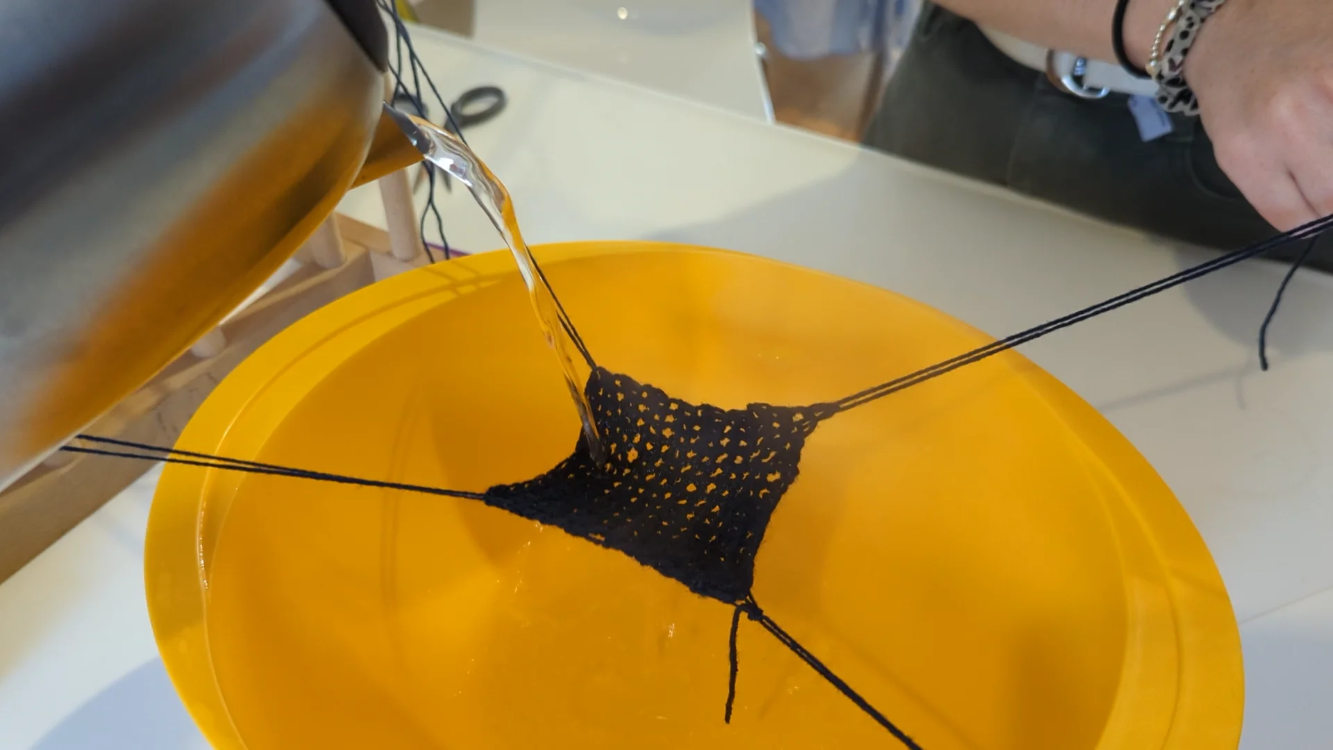 Pouring Boiling Water on Crocheted Wool on Vimeo