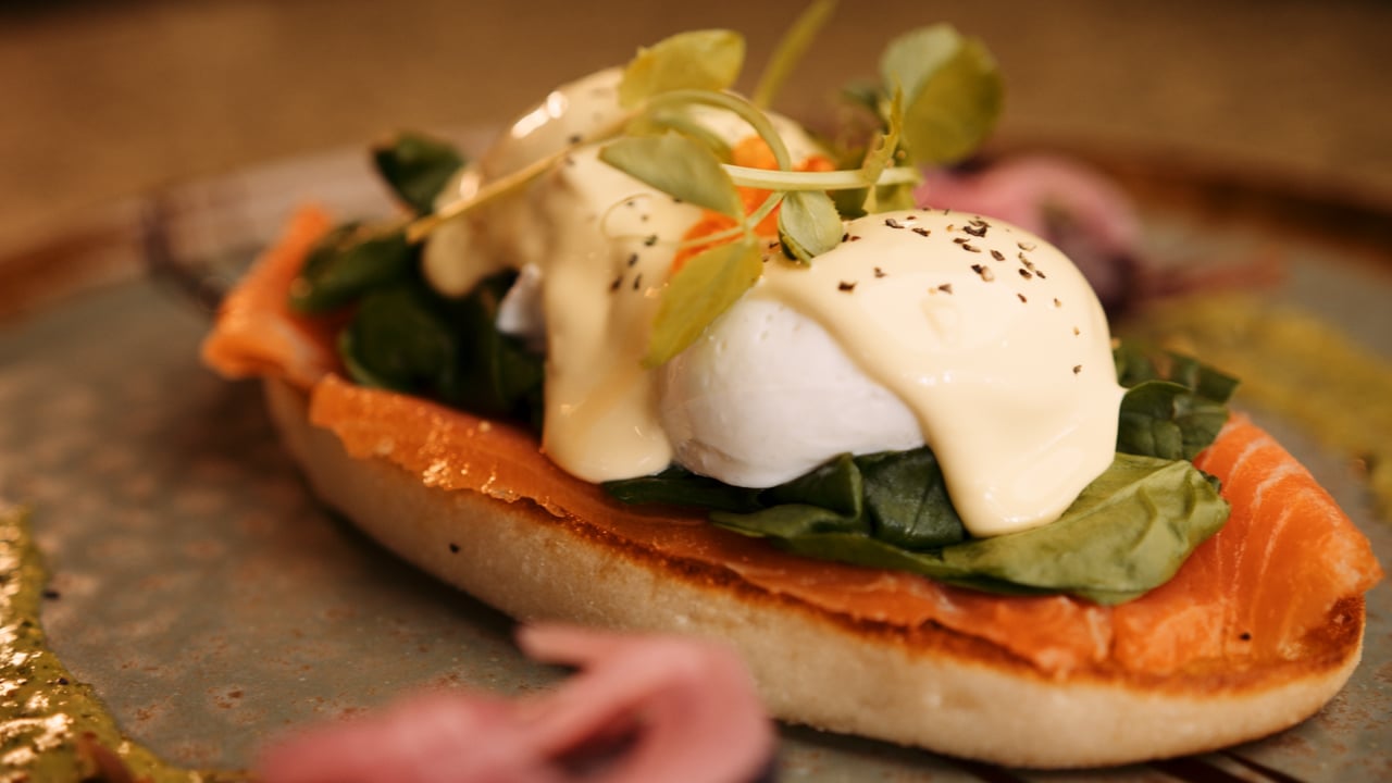 Eggs benedict with smoked salmon, a still from the O'Donnells Palm Cove TV commercial filmed by Mustard