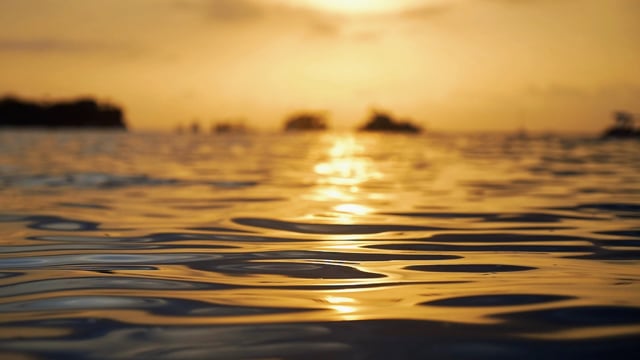 Sunset and its reflection on the sea