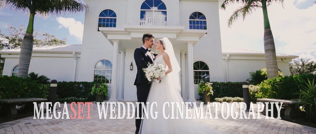 Bride and groom standing in front of church