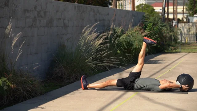 Wall Scissor Sit Up Throw