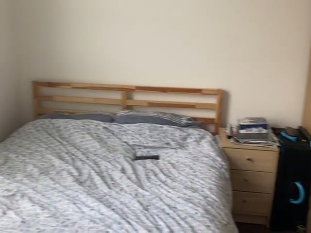 Video 1: Sunny bedroom with king size bed