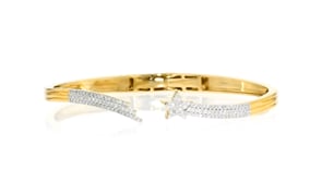 50 ct. t.w. Diamond Star Bypass Bangle Bracelet in 18kt Gold Over Sterling
