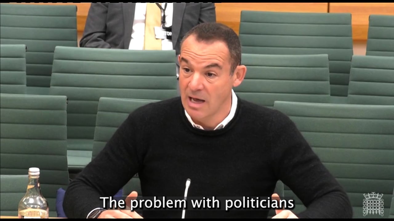Martin Lewis of MoneySavingExpert speaks to John Nicolson MP during DCMS Committee