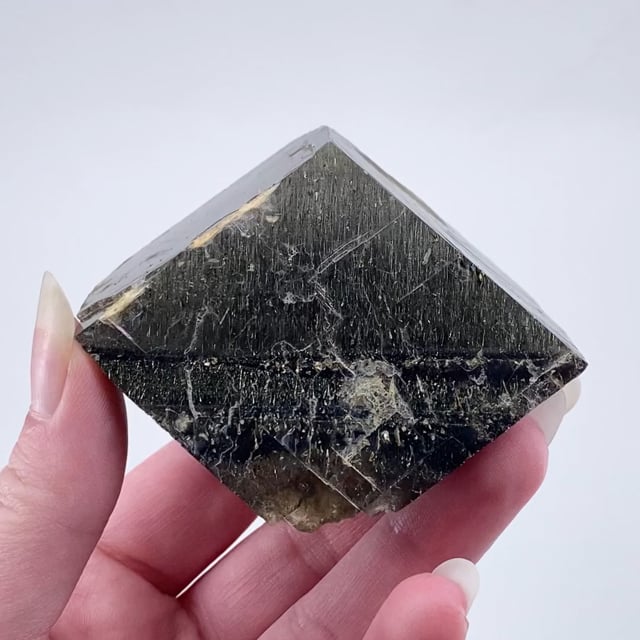 Calcite included with rare Chalcopyrite needles