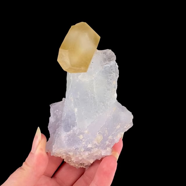 Calcite (doubly-terminated) on Fluorite