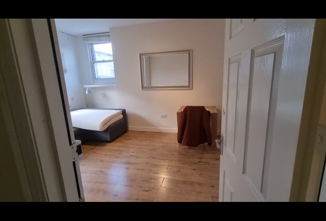Video 1: Door to shower/toilet on left, out to the landing leading front door on right