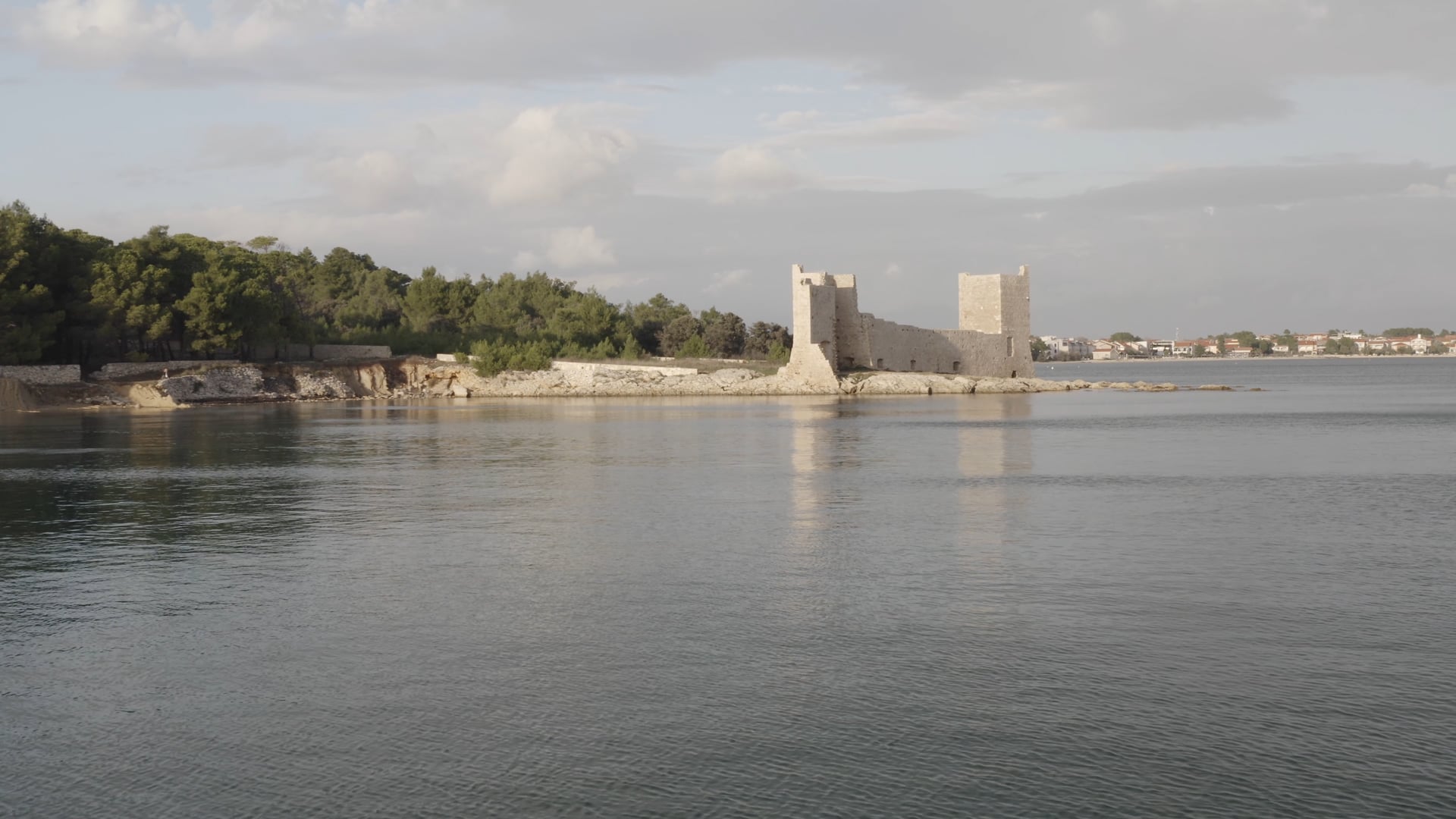 Castle ruins on the seashore, approaching