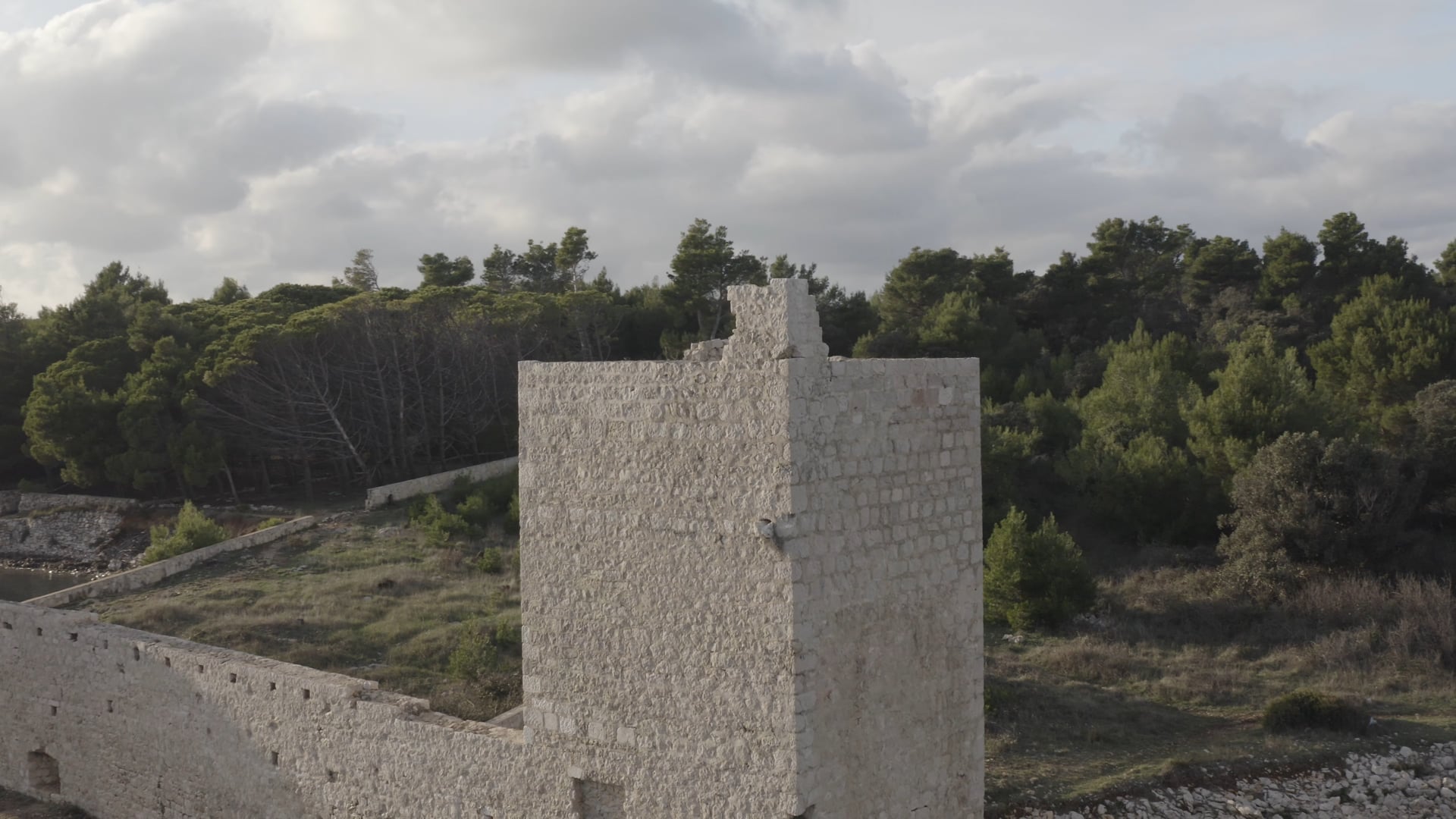 Castle ruins on the seashore, fade away