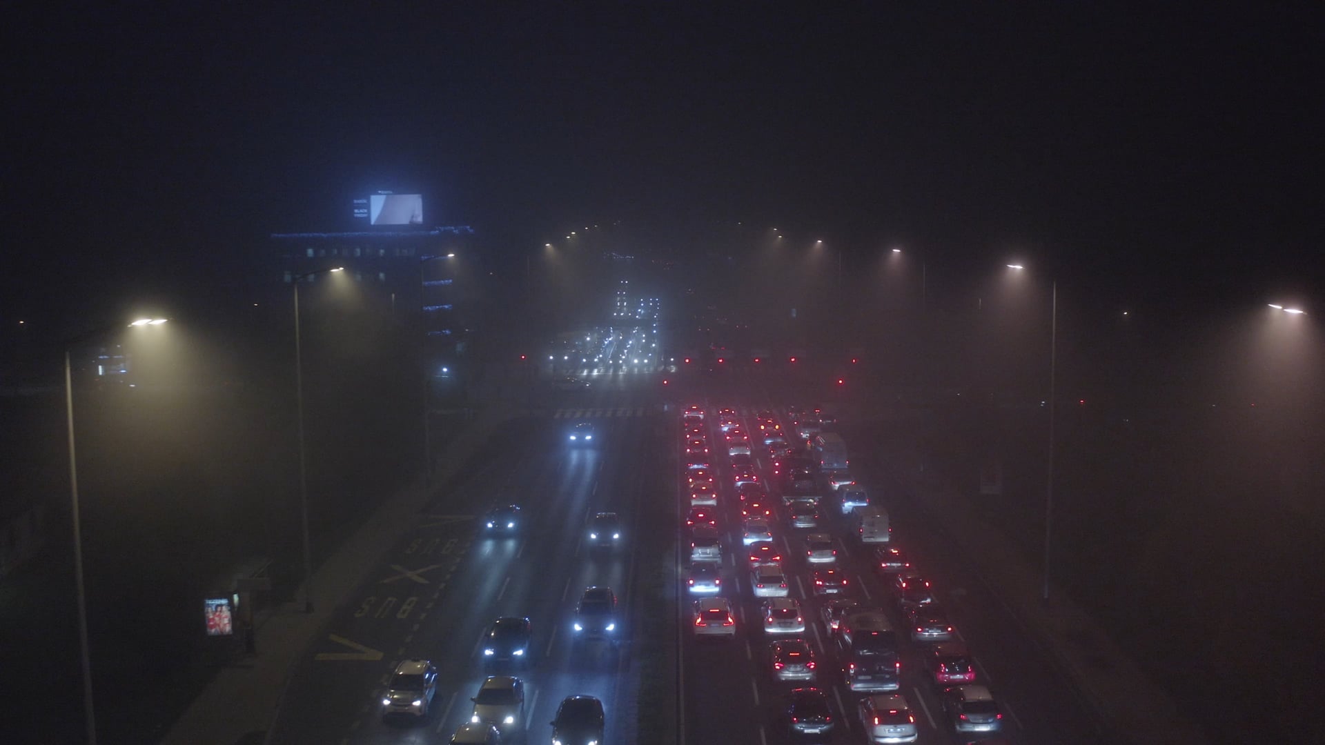 Night traffic in Zagreb, one side of the highway standing on the red light