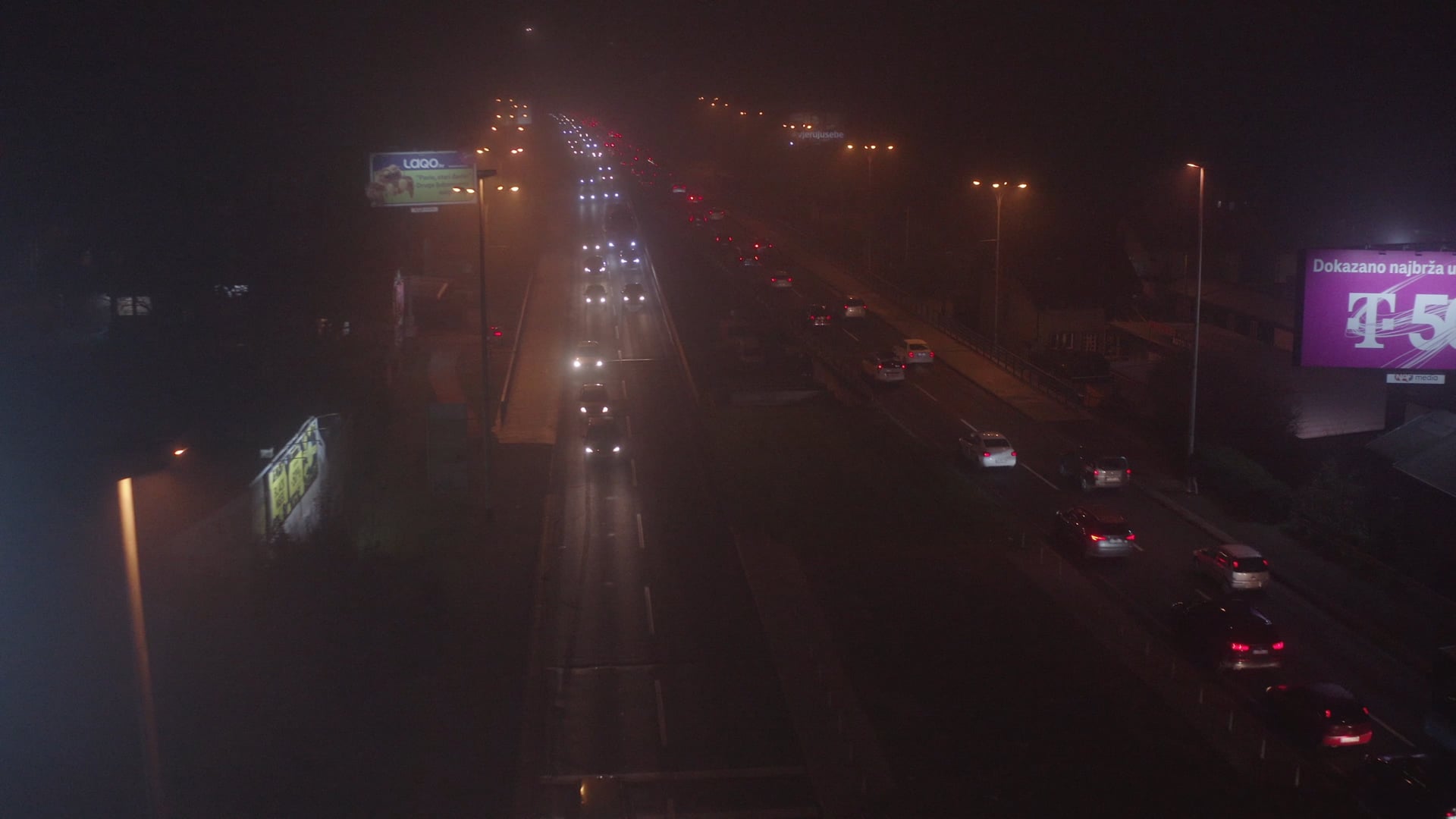 Night traffic, short shot, camera slowly moving with the traffic