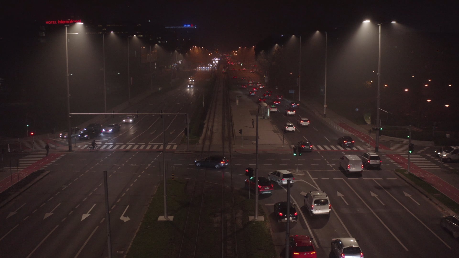 Night traffic, cars and trucks turning left