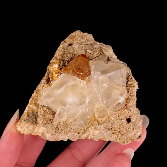 Scheelite with Fluorite on Muscovite (rare association for the locality)