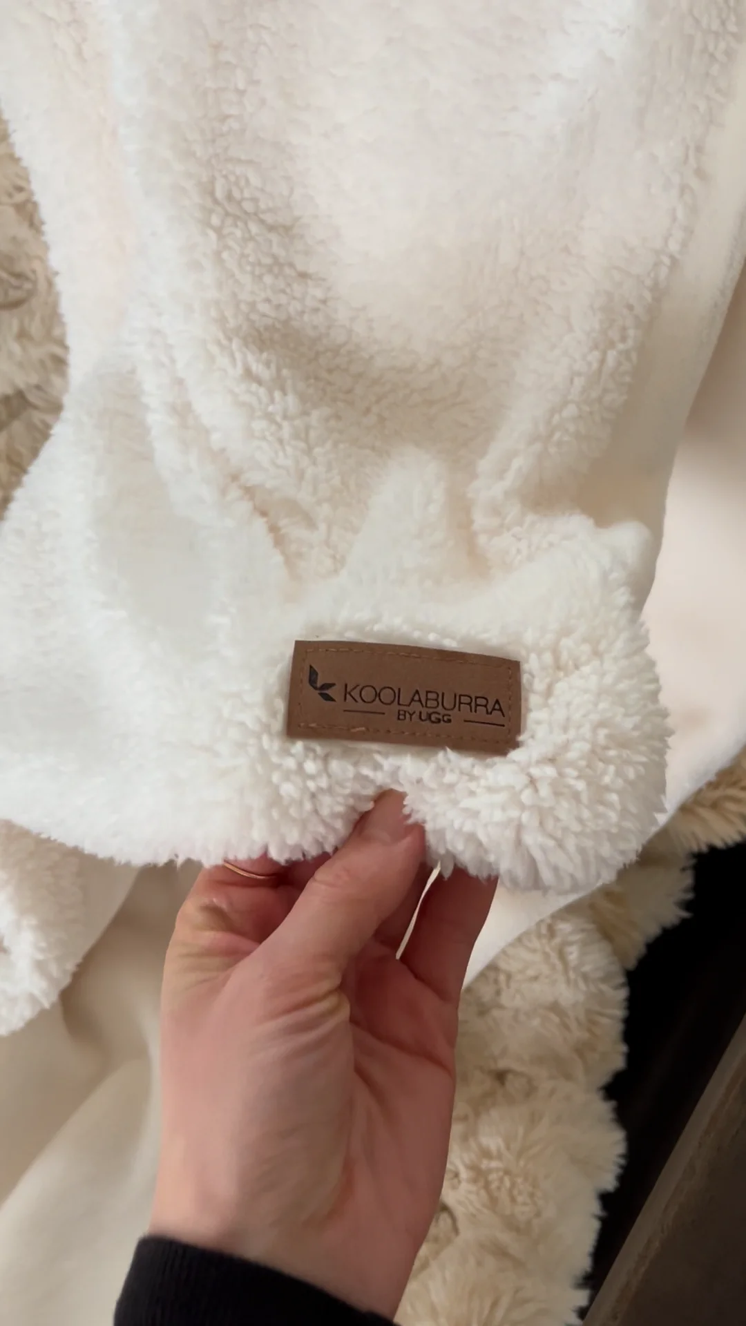Up close view of kohls koolaburra by UGG blanket tag on Vimeo