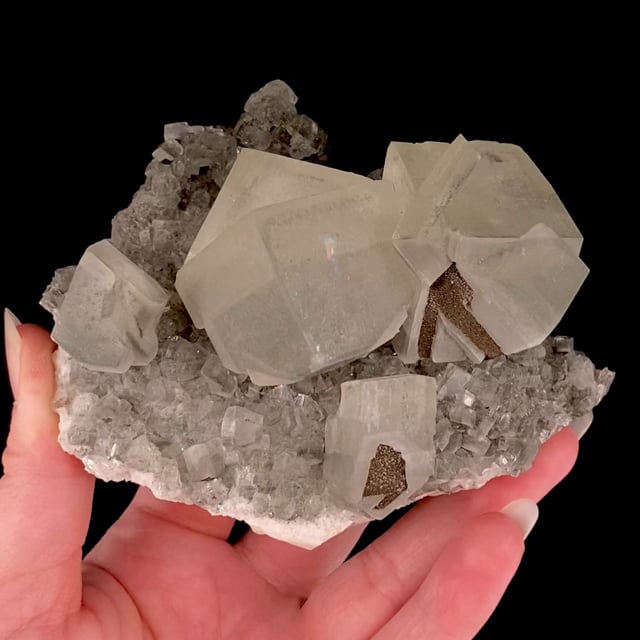 Calcite (excellent twins with Marcasite inclusions)