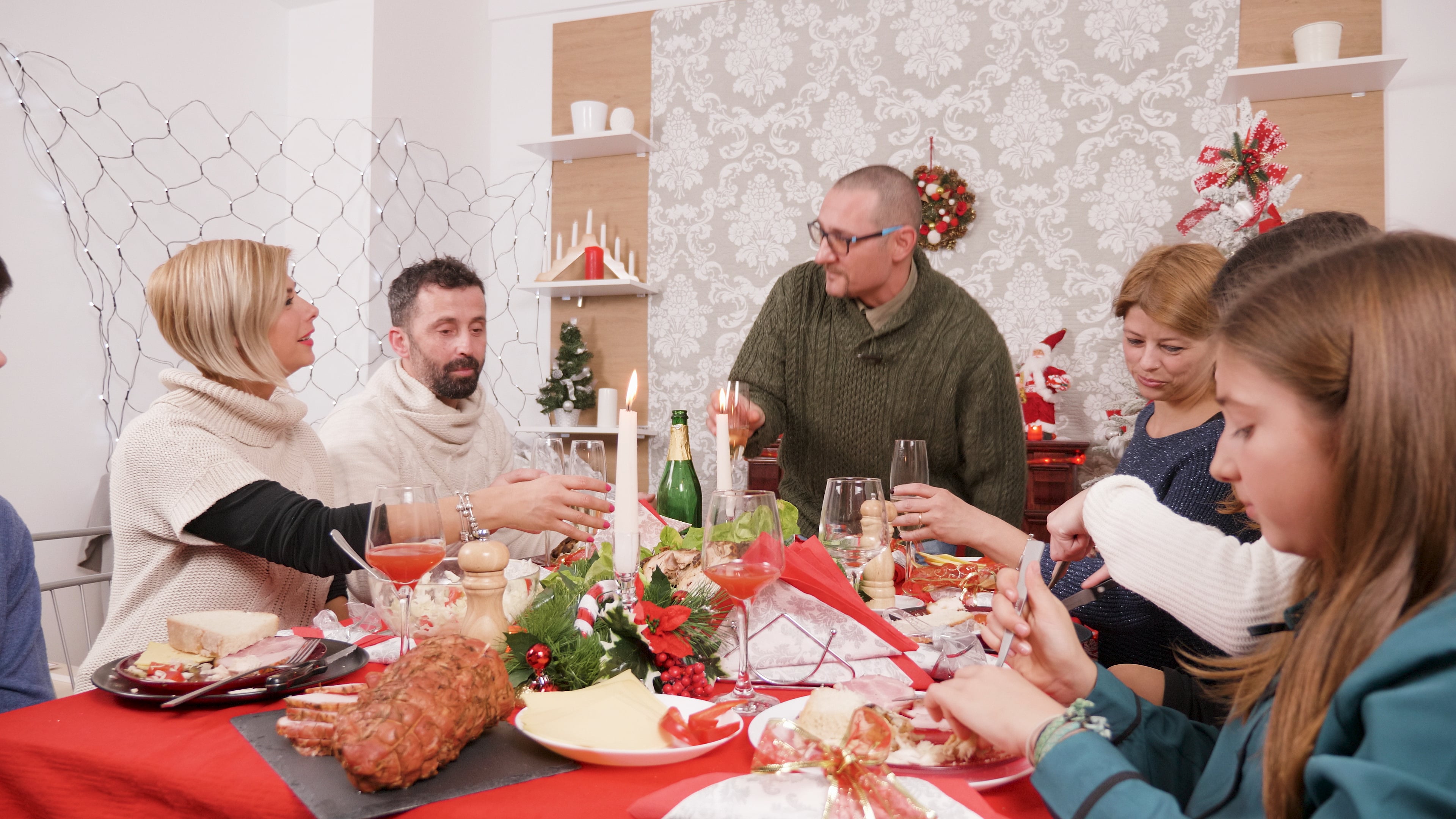 man-making-a-toast-at-family-dinner-with-champagne-2022-07-21-07-08-54 ...