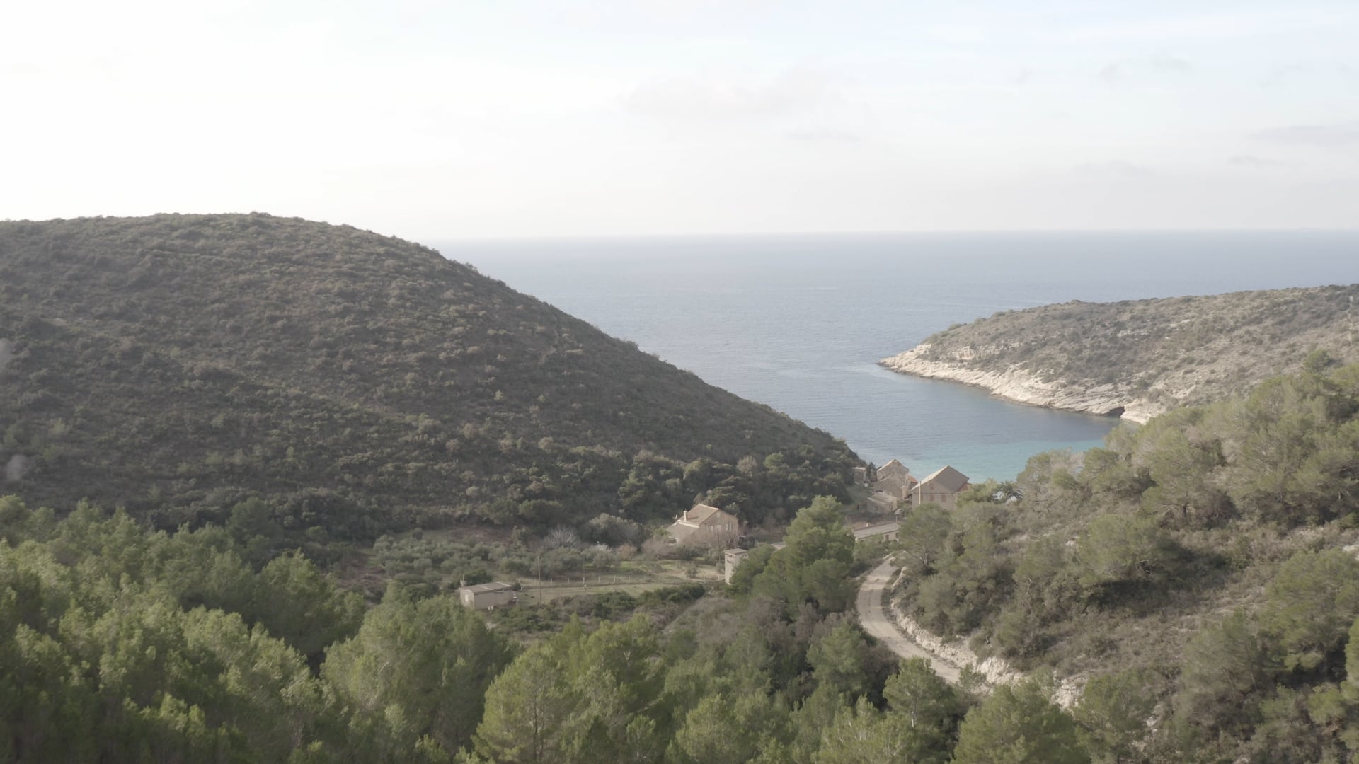 Approaching the small bay, beautiful crystal blue sea