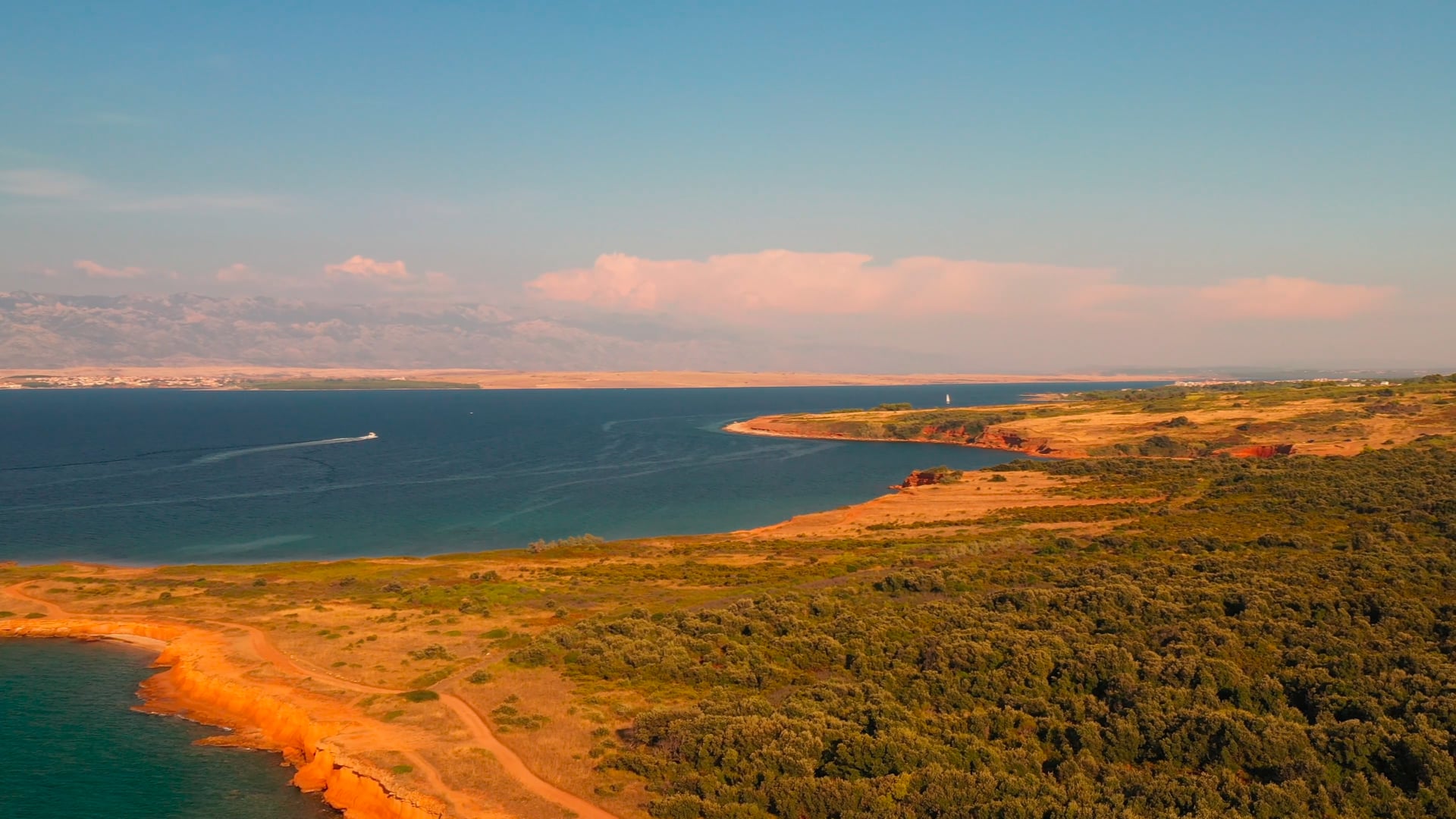 Panning from the sea to the forest on the island