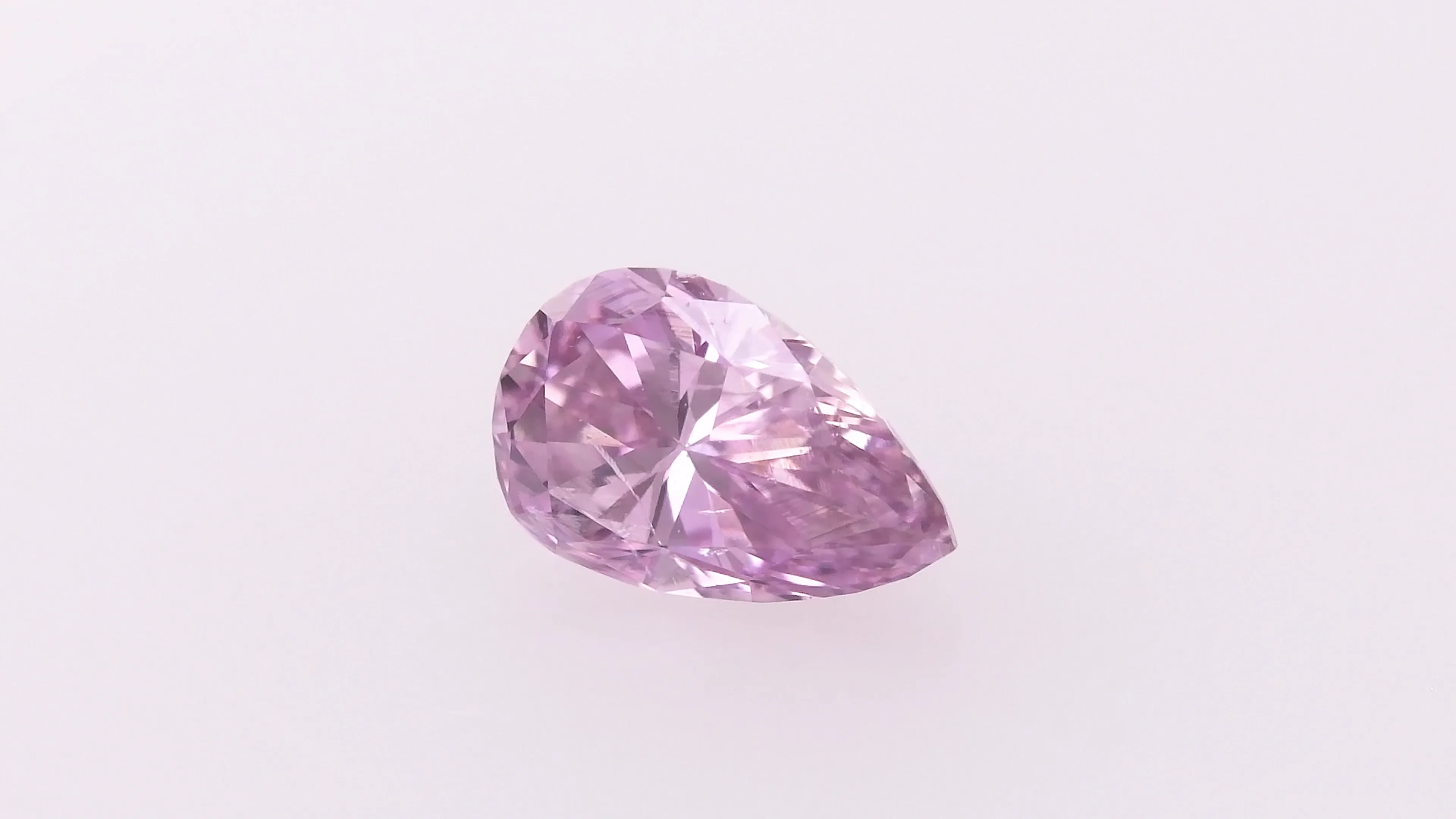 0.08 Carat Fancy Intense Pink Purple Pear Diamond (SI1) GIA
