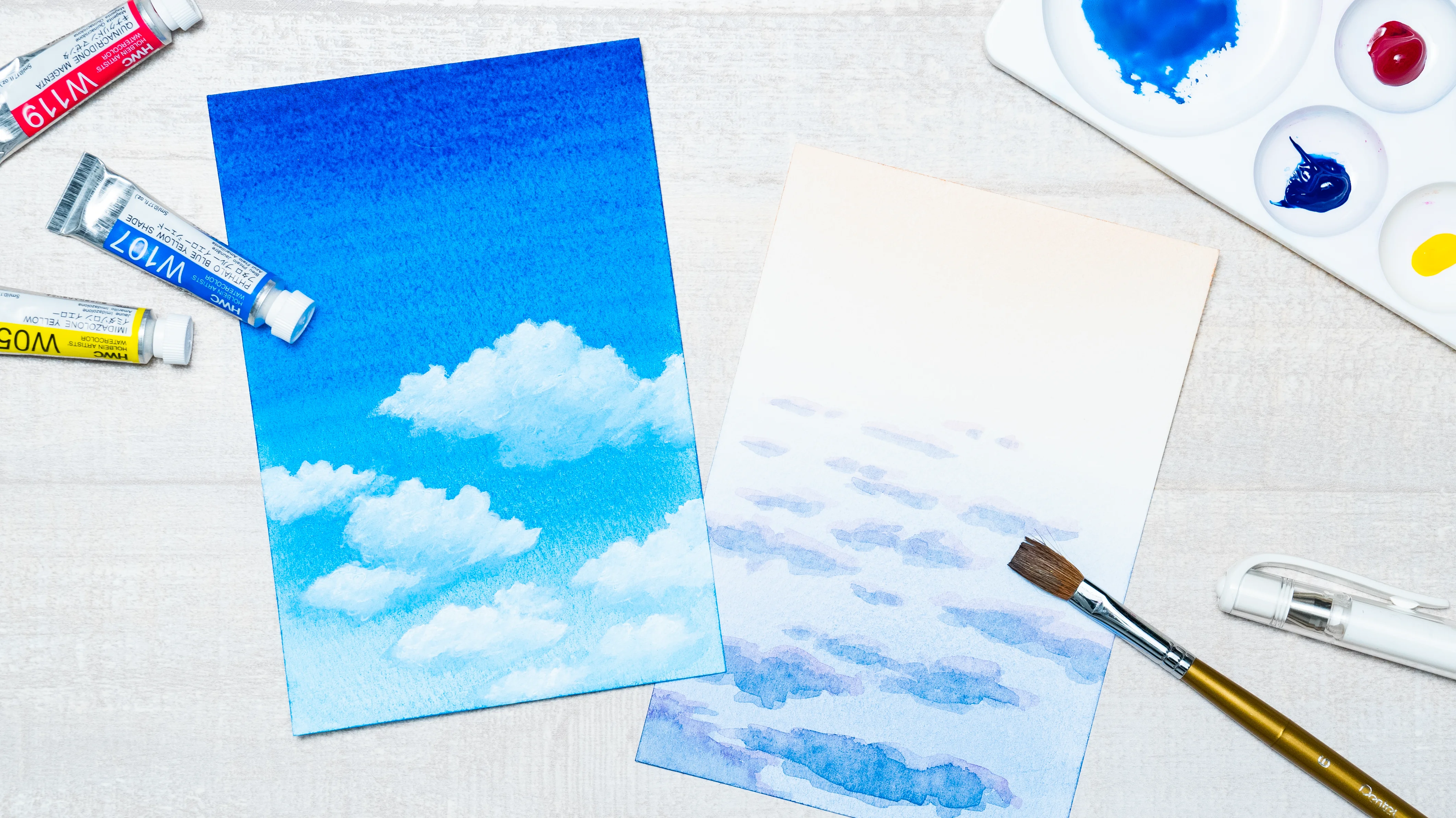 三色の絵の具で広がる、美しい空の水彩画 – Lakit
