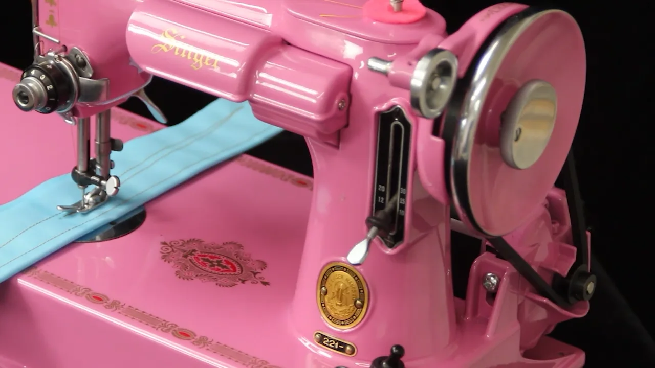 Two pink machines; Featherweight & SewHandy on Vimeo