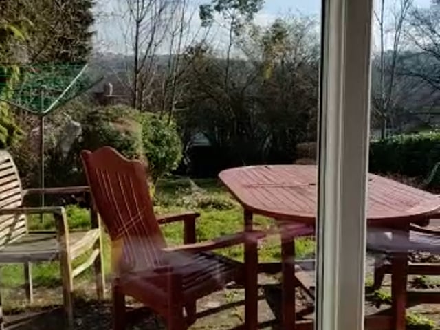 Video 1: Morning sunrise in room over garden 