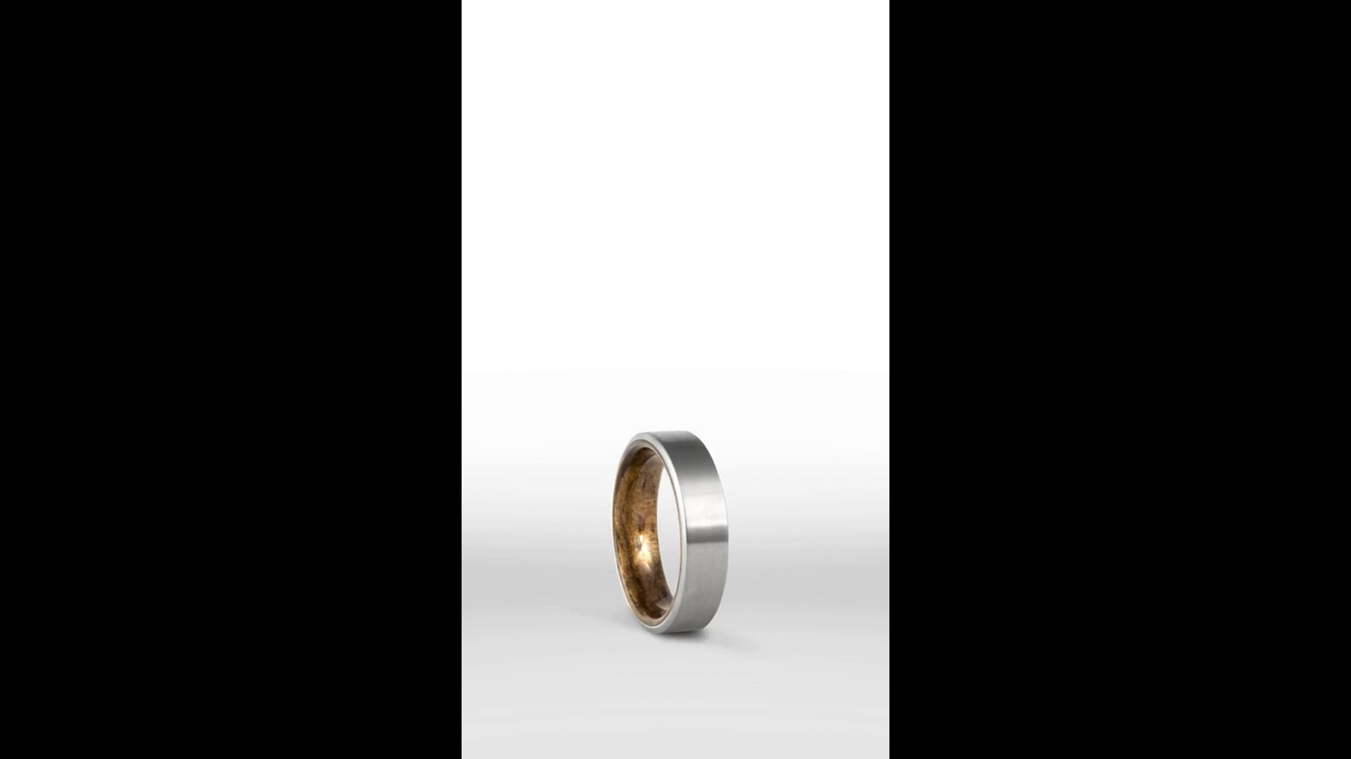 Anello nuziale in titanio spazzolato nero da 6 mm e oro rosa 18k
