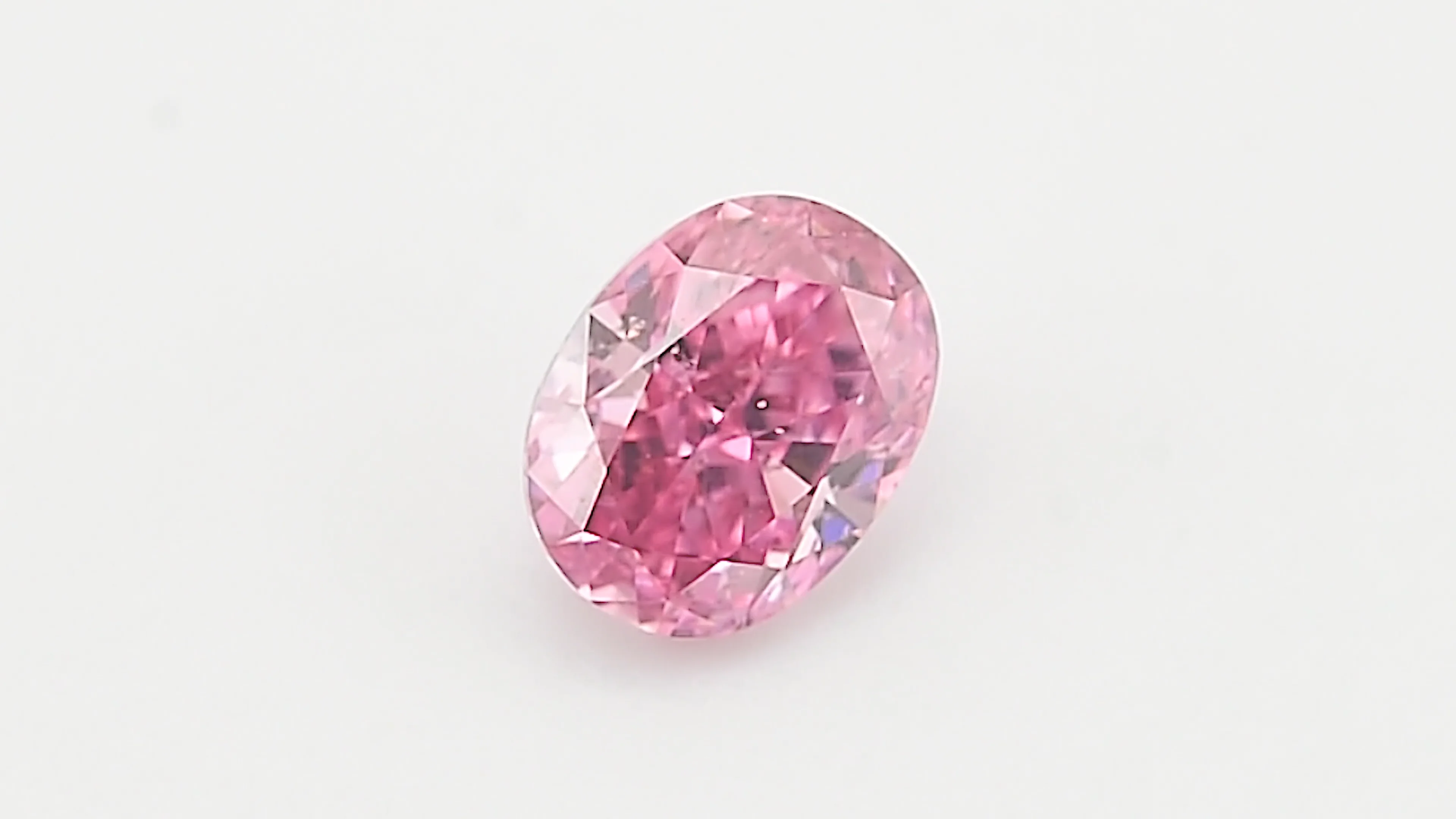 0.75 Carat Fancy Vivid Purplish Pink Oval Diamond SI2 GIA