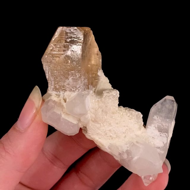 Topaz with doubly-terminated Quartz crystals