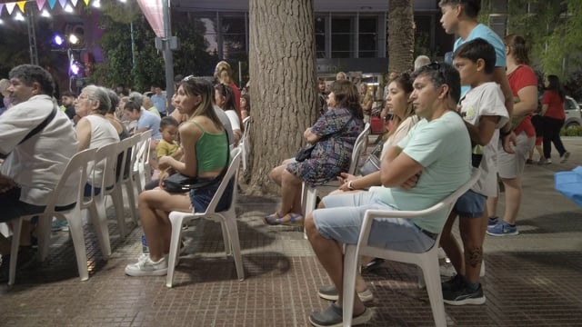 Sitting in the audience side profile