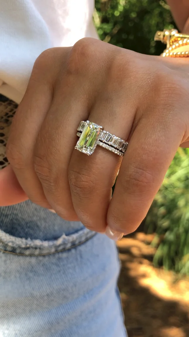 Emerald cut engagement ring store with diamond band