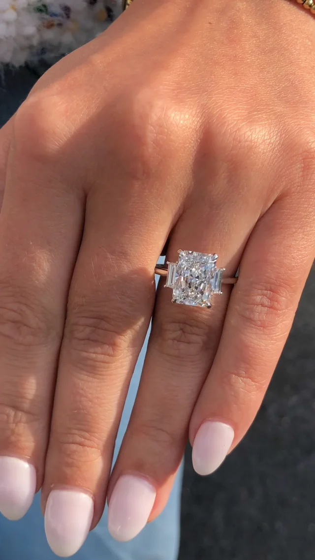 Radiant cut diamond ring store with side stones